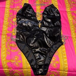 Black Faux Leather One-Piece bodysuit with Chain Detail. NEW